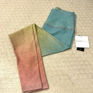 Beyond Yoga high waisted leggings in a fun rainbow gradient!